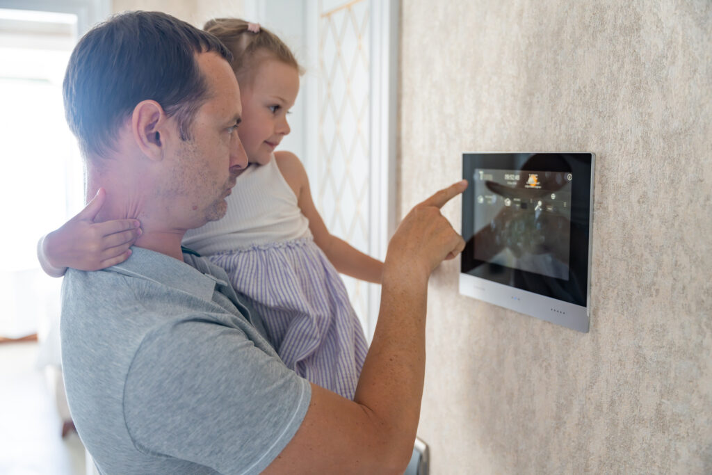 An electrical upgrade enables a father and daughter to program their smart home system
